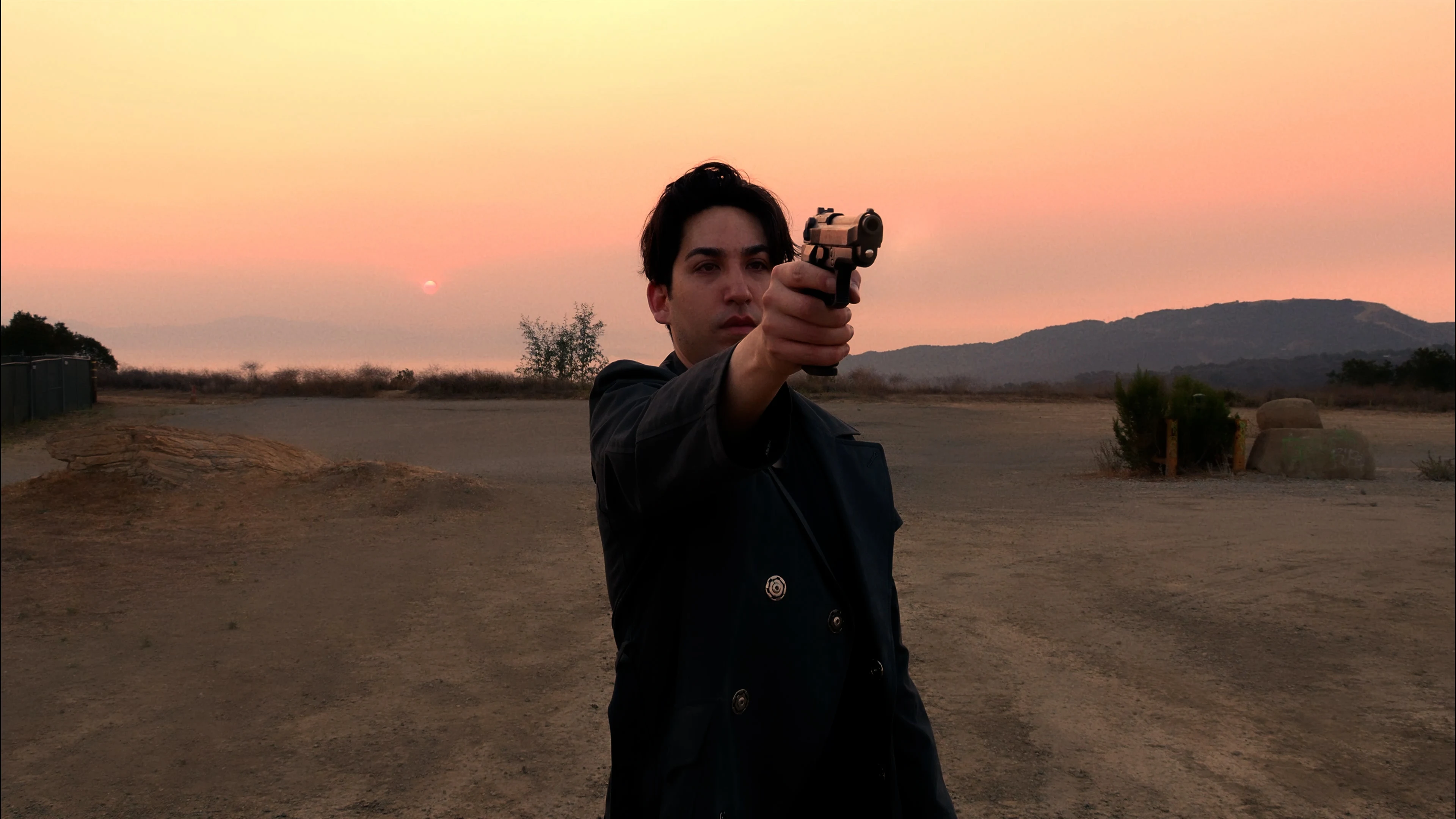 Ian Bloom in King holding a statue of Anubis in a close interior shot