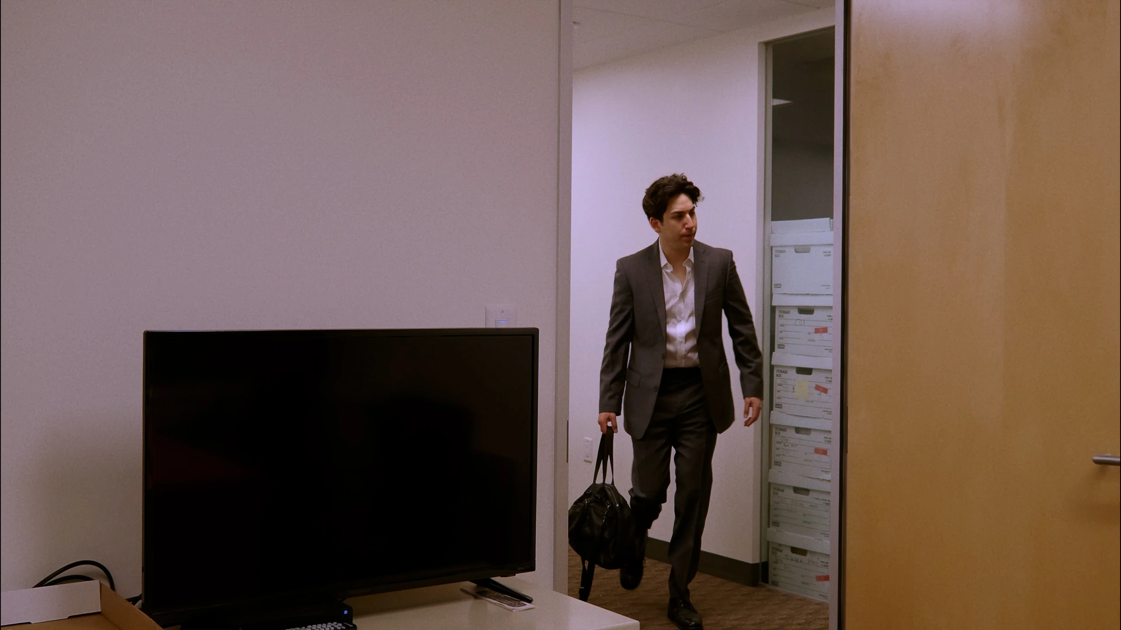 Ian Bloom in King driving through Los Angeles in a car interior close shot